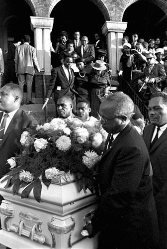 Share grief Mourners follow the coffin of a bombing victim during a funeral in Birmingham, Alabama. The victim was one of four young girls -- killed in a September 15, 1963, bombing.