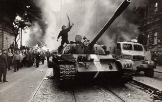 He climbed up onto the tanks and he ran into protestors that confronted the heavily armed soldiers. His images became a document of the conflict and symbol of the spirit of the resistance movement.