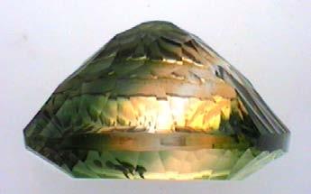 Another diagnostic feature of synthetic origin is the presence of a seed crystal, commonly in the form of a fragment or flat plate.