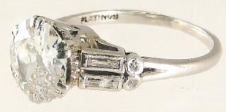 $2,500 - $3,500 423 Audemars Piguet & Co Art Deco platinum rock crystal and diamond pendant watch.