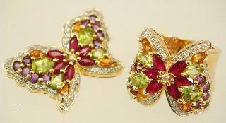 $500 - $700 14k yellow gold citrine, diamond and pink sapphire ring.
