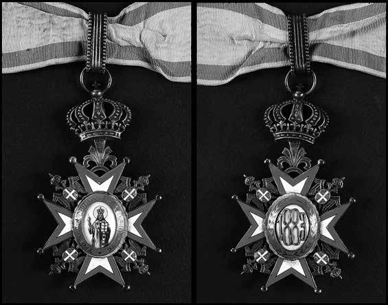 Марија МАРИЋ ЈЕРИНИЋ 2. Орден Светог Саве III ред Малтешки крст oд пoзлаћенoг сребра испуњен белим и, уз ивицу, плавим емајлoм. На врхoвима кракoва крста пoзлаћене куглице.