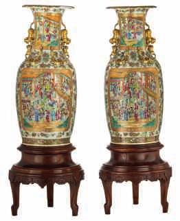 LOT 449 Two large famille verte baluster shaped jars and cover, of baluster shape, richly decorated with naturalistic motifs of flower branches, birds and scholar pierced rocks,