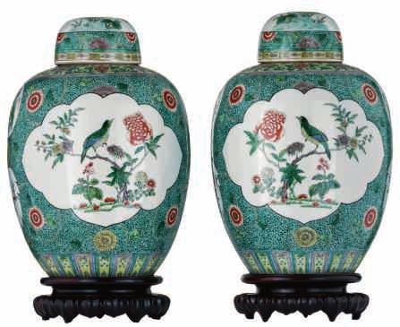 black ground polychrome bottle vases, decorated with dragons amid clouds and waves, chasing the flaming pearl, H 53,5-54 cm 3000-5000 LOT 452 Two large Chinese famille rose floral