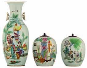 Chinese famille rose vase, overall decorated with an animated court scene, the handles Fu lion shaped; added a ditto