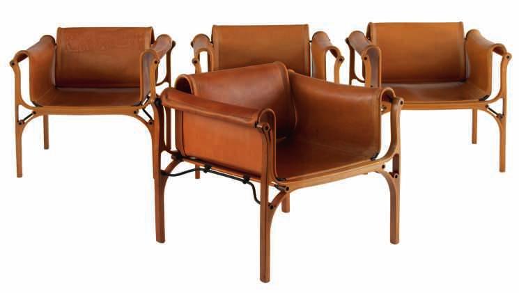 1500-2000 155 LOT 689 A set of four armchairs by Cristian Valdes, Valdes Chair, leather, steel tubing and laminated wood, part of the Exposición