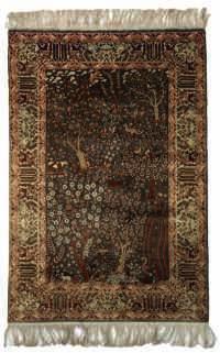 An Oriental silk carpet with floral motifs, 138 x