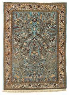 LOT 783 An Oriental woollen rug, decorated with