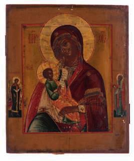 831 An East European icon of three saints, 19thC,