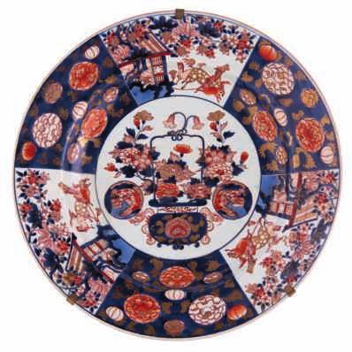 basket on the central panel and with cranes in the border, ø 54-57 cm 800-1200 LOT 207 A large Edo period Japanese Imari