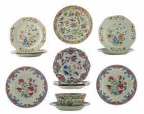 famille rose plate, decorated in the centre with flowering vase and basket, the wavy border with flower