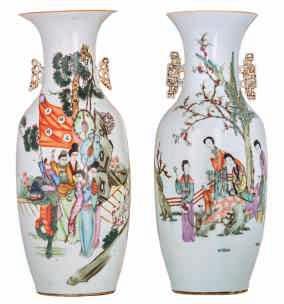 LOT 277 A pair of Chinese famille rose vases, decorated with figures in a cortege