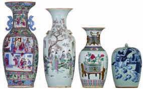 500-800 88 LOT 394 Two pairs of Chinese floral and relief decorated cloisonné and champlevé vases,