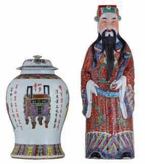 LOT 409 A Chinese polychrome and floral decorated Guanyin, the garment decorated