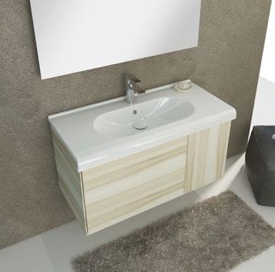The cabinets with sharp lines, merging and at the same time contrasting with the flat washbasin with round lines,