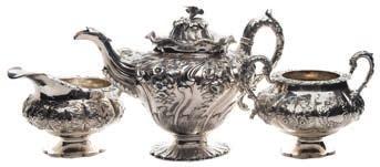 * 600-800 308 A matched early 19th century silver three-piece tea service the teapot with maker s marks for J B Cameron and