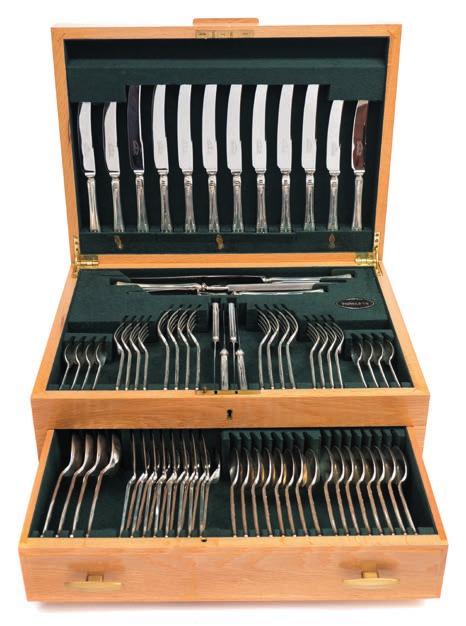 224 An Elizabeth II silver flatware service, maker Cooper Brothers & Sons, Sheffield, 1974 includes three-piece silver handled carving set, eight silver handled table knives, eight silver handled
