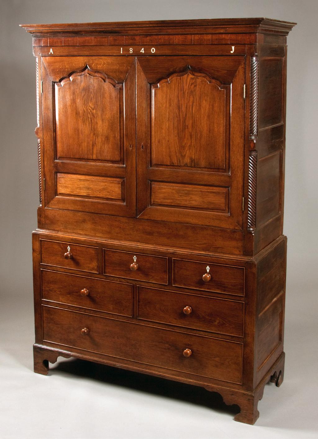 09 2016 TIM BOWEN ANTIQUES 1 Oak linen press 4650 Cwpwrdd prés derw Wonderful Welsh oak linen press, which is superbly made with some unusual detail, such as the mahogany and bog oak banded frieze