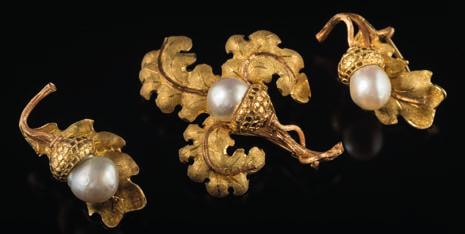 A cultured baroque pearl brooch and pair of matching earrings each designed as oak leaves with acorns, signed M Buccelati, 44.5gms gross weight.