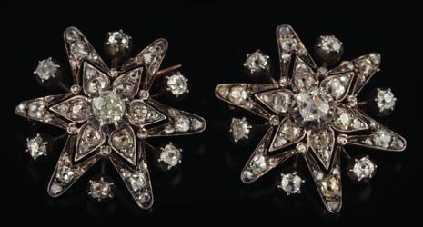 * 800-900 426 A pair of late 19th century diamond mounted, six-point star brooches each 26mm wide with