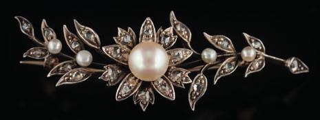 * 300-400 433 A rose diamond and cultured mabe pearl, flower head brooch the mabe pearl approximately 12mm diameter, total length of brooch approximately 36mm, 12.5gms gross weight.