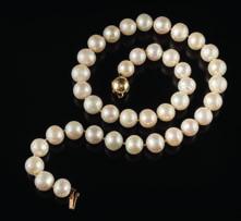 460 A freshwater cultured pearl, singlestring necklace with 39 individually knotted, freshwater cultured pearls each approximately 11mm diameter and on diamond mounted, spherical clasp, 69gms gross