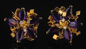 480 A pair of amethyst and diamond floral cluster ear-clips of abstract design, each with five marquise-cut amethysts highlighted with