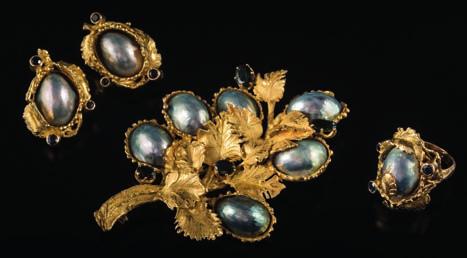 492 A suite of baroque cultured pearl and sapphire mounted jewellery including brooch, earrings and ring, each