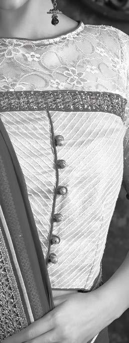 Lace plays an important role in this Sari and jacket blouse combo, with the high neckline consisting