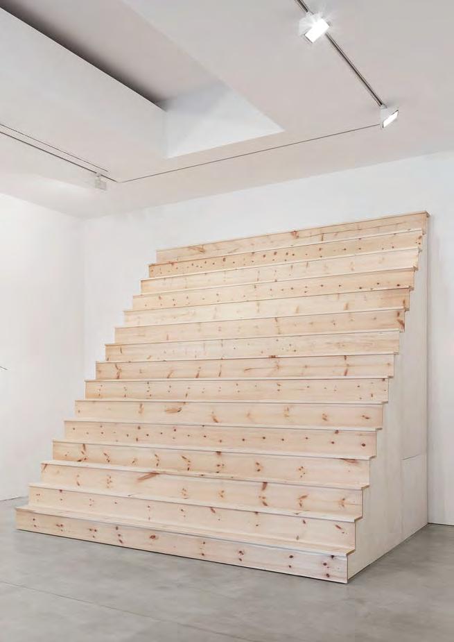 wooden set of risers and treads that ends close to the ceiling and was first shown at Greene Street Gallery in 1974. Stairs challenges the viewer to climb up the stairs.
