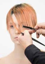 STEP 10 - Comb the top layers in a middle part and use the tip of the