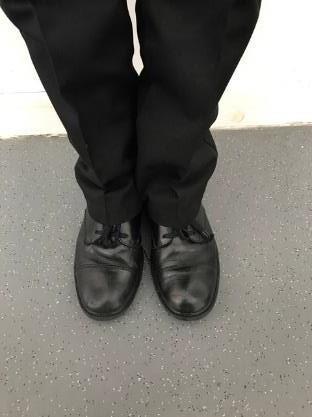 the shoe, belts may be worn but must be black Tailored full length black trousers or approved school skirt A school tie Black jumper or cardigan with school logo, optional and only to be worn under