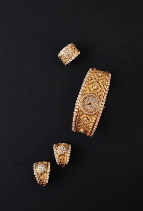 Select Jewellery & Watches 13 25 A pair of diamond set ear clips each of tapering design, the central pavé set diamond dome to a textured ground with ropetwist detail and a part border of graduated