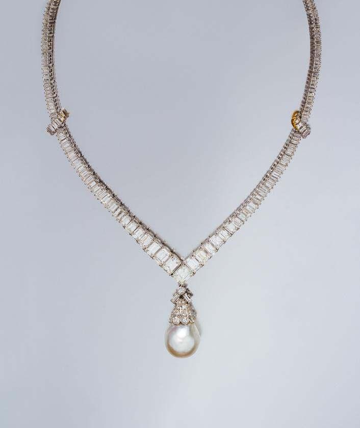 Sale 421 Lot 184 A Fine Platinum and Diamond Necklace, Van Cleef & Arpels, with a Detachable Cultured Pearl and Diamond Pendant, consisting of a single row V-shape necklace containing one octagonal