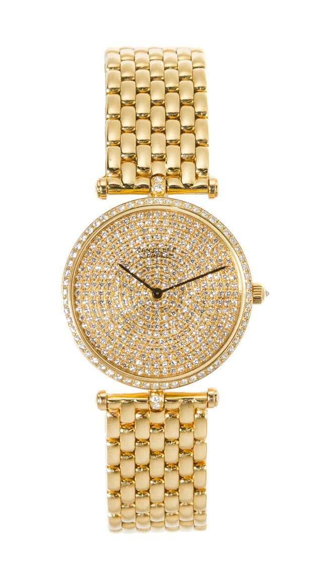 Sale 394 Lot 519 An 18 Karat Yellow Gold and Diamond La Collection Wristwatch, Van Cleef & Arpels, the bezel and dial containing numerous round brilliant and single cut diamonds weighing