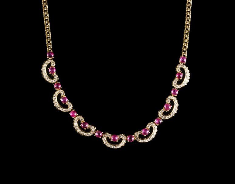 335 338 336 337 Lot 335 A charming diamond and ruby scroll necklace The vivid red rubies each alternately surrounded by a delicately scalloped set of diamonds PHP 185,000-200,000 Lot 337 A pearl and