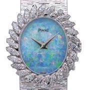 2100 2100 PIAGET A LADY'S WHITE GOLD AND DIAMOND-SET BRACELET WATCH WITH OPAL DIAL REF. 9342 A6, CASE NO.