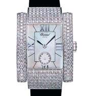 2104 2104 CHOPARD A LADY'S WHITE GOLD AND DIAMOND-SET WRISTWATCH WITH MOTHER-OF-PEARL DIAL REF.