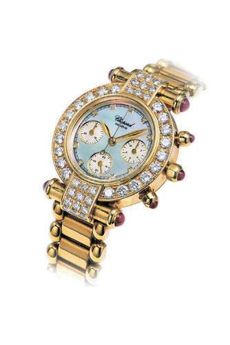 2032 2032 CHOPARD A FINE LADY'S YELLOW GOLD, RUBY AND DIAMOND-SET CHRONOGRAPH BRACELET WATCH WITH MOTHER-OF- PEARL DIAL REF. 4143, CASE NO.