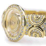 2036 2036 CHOPARD A LADY'S YELLOW GOLD AND DIAMOND-SET BANGLE WATCH REF. 4117, HAPPY DIAMOND, CASE NO.