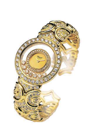 transparent ring containing seven floating diamonds, yellow gold and diamond-set Chopard bracelet and