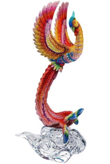 A very special collector s item, the fascinating Phoenix is limited to just 100 numbered pieces worldwide. It is embellished with 46 900 handset crystals in a rainbow of colours.