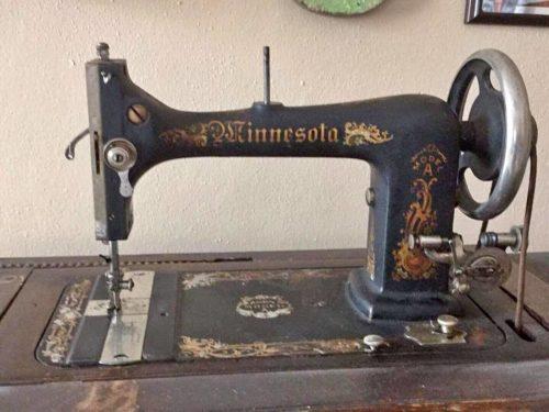 Another Minnesota girl This description: Old Minnesota brand sewing machine (prior to the company being renamed Sears Roebuck)! Beautiful intricate drawers that could use some TLC or display as is.