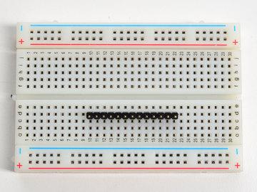 It will be easier to solder if you insert it into a breadboard