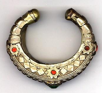 Jewelry 2005.768 Bracelet Silver alloy, brass, glass / hand-crafted Small open hollow silver bracelet with rounded brass terminals, inner surface lined with brass.