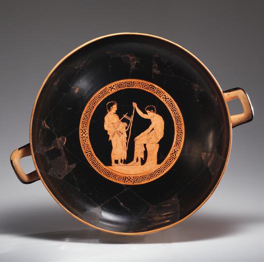 Highlight An Attic Red-figure Cup, Attributed to the Painter of Louvre G 456 By John Robert Guy Within the tondo of the interior, encircled by a band of continuous rightward maeander punctuated by