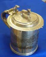 Lot 237 235 A novelty silver Cruet Set modelled as drums and comprising a hallmarked silver Pepperette and a larger Mustard having blue glass liner, Sheffield assay marks, the Mustard 4.