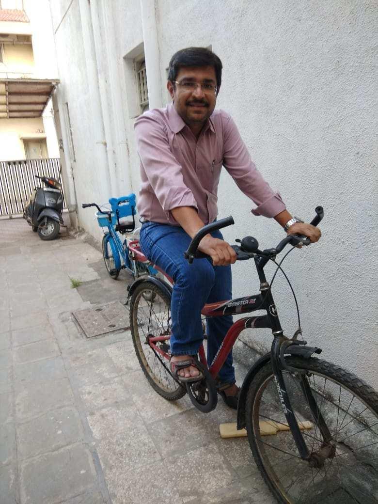 Dr Krunal Chandarana uses a bicycle to commute wherever