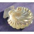 silver shell shaped butter or jam dish with 3 ball feet, dated 1909 159.