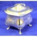 Edward VII shaped tea caddy with hinged lid, on 4 cast legs with paw feet, 1904,